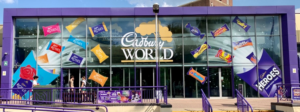 Cadbury World entrance with colourful chocolate product graphics
