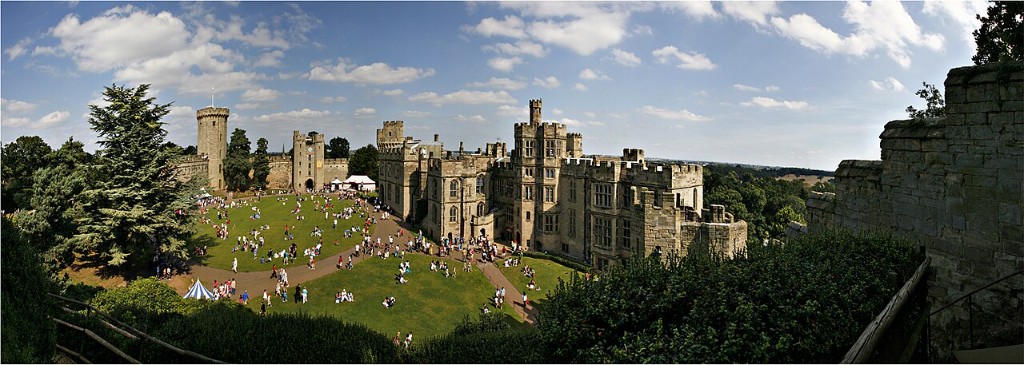 Warwick Castle courtyard with visitors on the lawns