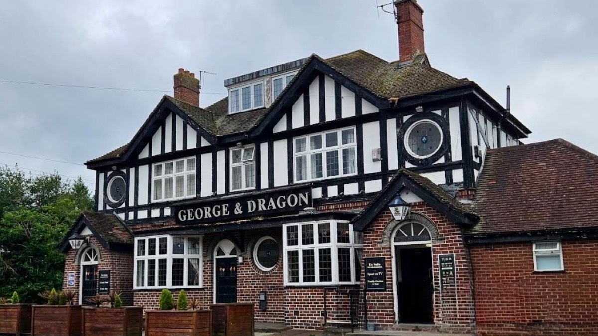The George & Dragon pub exterior with black and white timber framing
