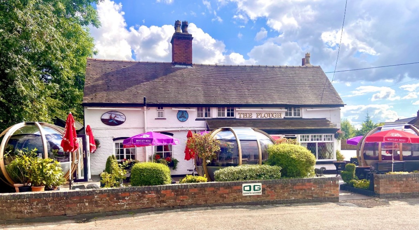 The Plough Inn pub in Shustoke village with outdoor glass dining pods