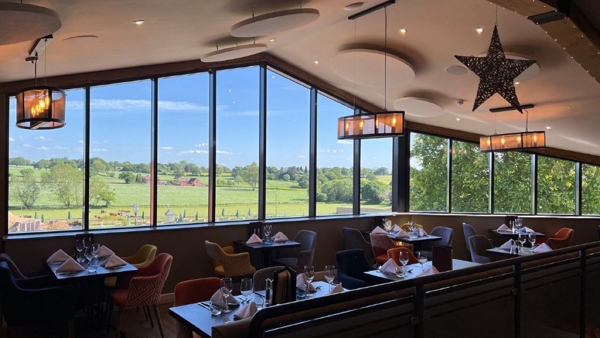The Barn At Berryfields restaurant dining room overlooking Warwickshire countryside