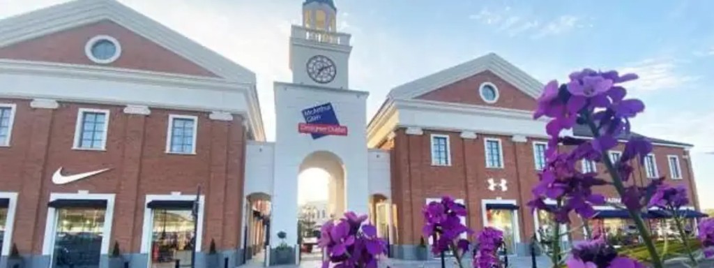 McArthurGlen Designer Outlet West Midlands clock tower and stores