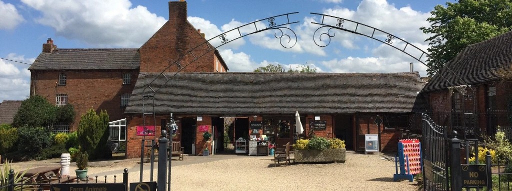 Hoar Park Craft Village courtyard with brick barn shops